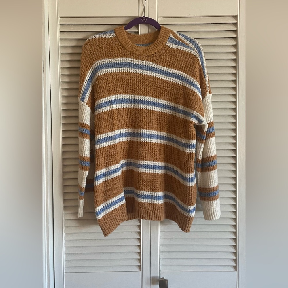 Brown sweater with blue and white lines